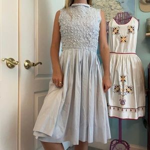 Vintage baby blue pleated and smocked midi dress from the 1960s.